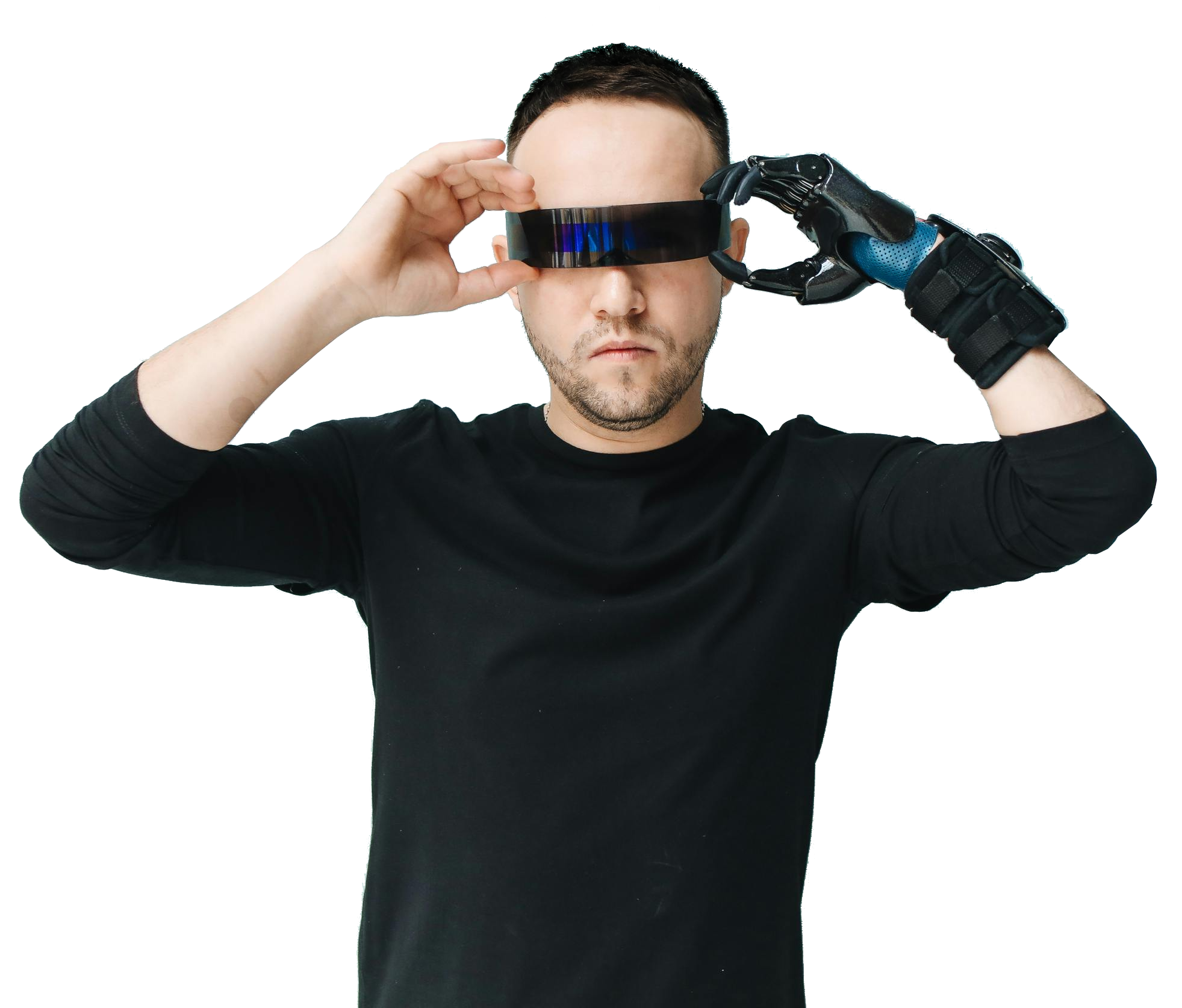 A man in a black shirt holds a sleek, futuristic visor over his eyes with one hand while wearing a black robotic glove on the other.